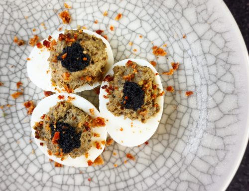 Eggs three ways. Crispy bacon and smoked eggplant stuffed eggs topped with caviar.